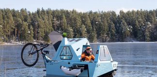 Z-Triton-House-Boat-Trike-On-Water