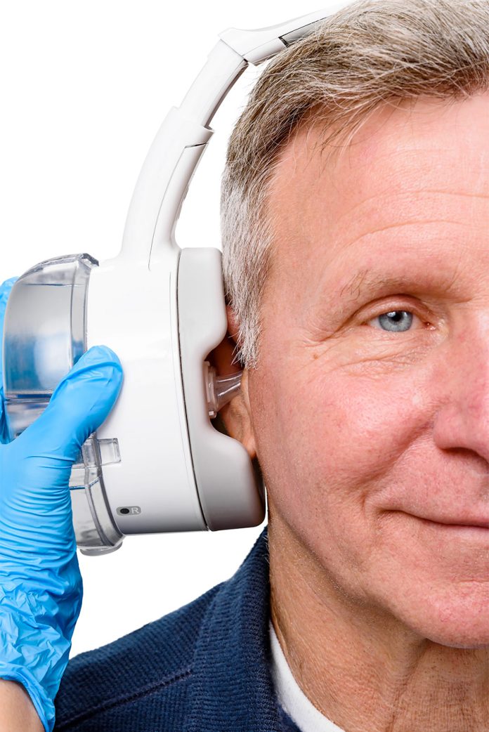 OtoSet automated ear cleaning system looks like a pair of headphones