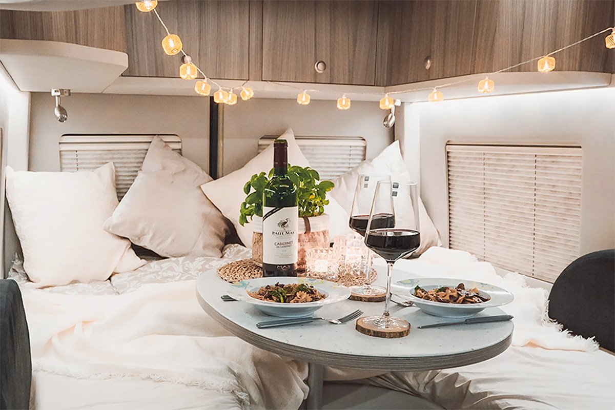 Innova Roadtrip 595L Yacht-Inspired Camper Van Dinner in Bed