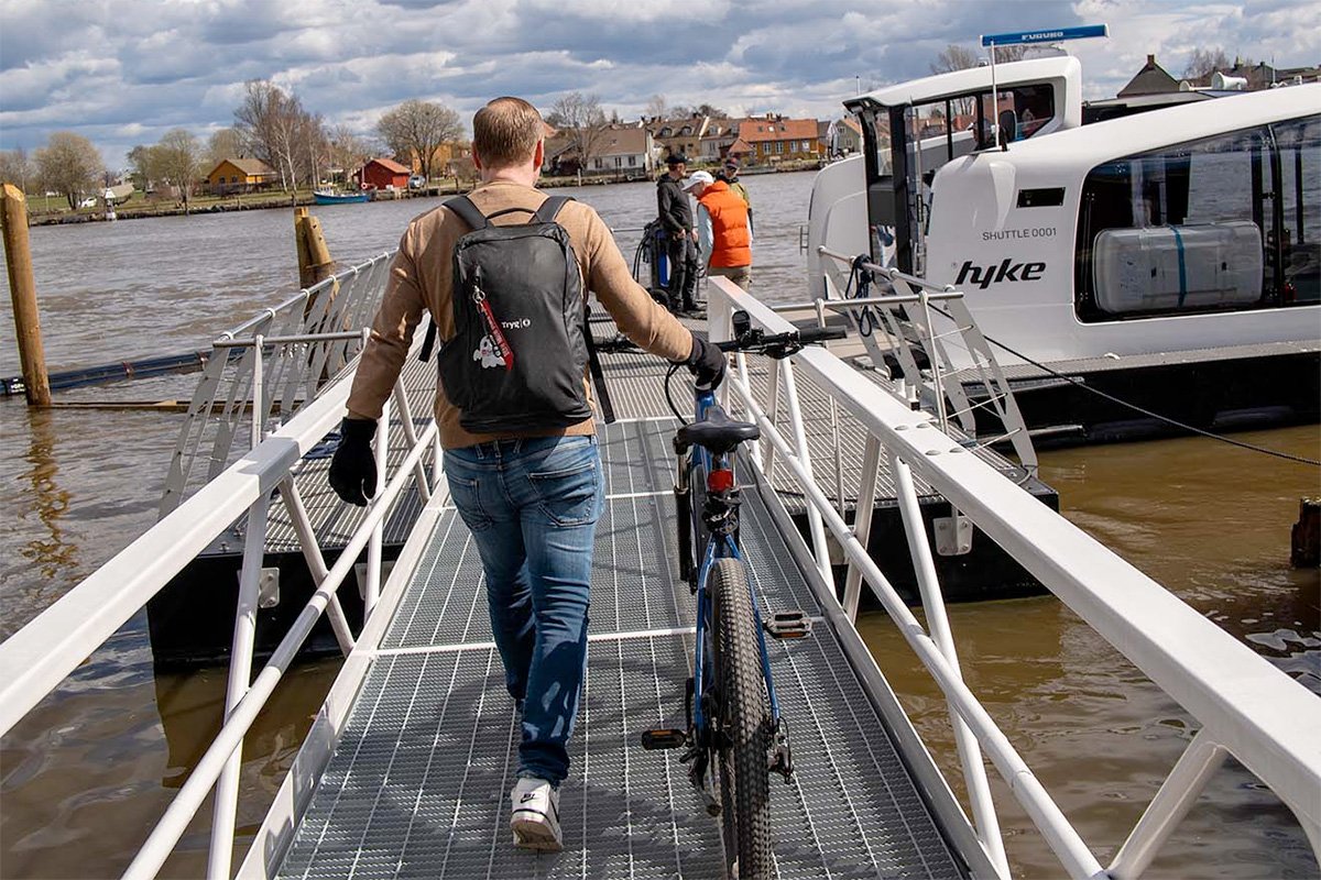Hyke Shuttle Electric Smart Ferry Dock Cyclist