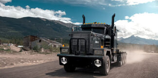 Edison Motors BDE-Series heavy-duty vocational semi truck driving on a mountain road