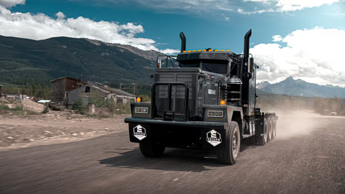 Edison Motors BDE-Series heavy-duty vocational semi truck driving on a mountain road