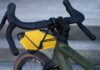 FLECTR CargoMate removable front bike rack fitted to a green bicycle