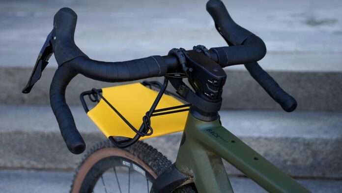 FLECTR CargoMate removable front bike rack fitted to a green bicycle