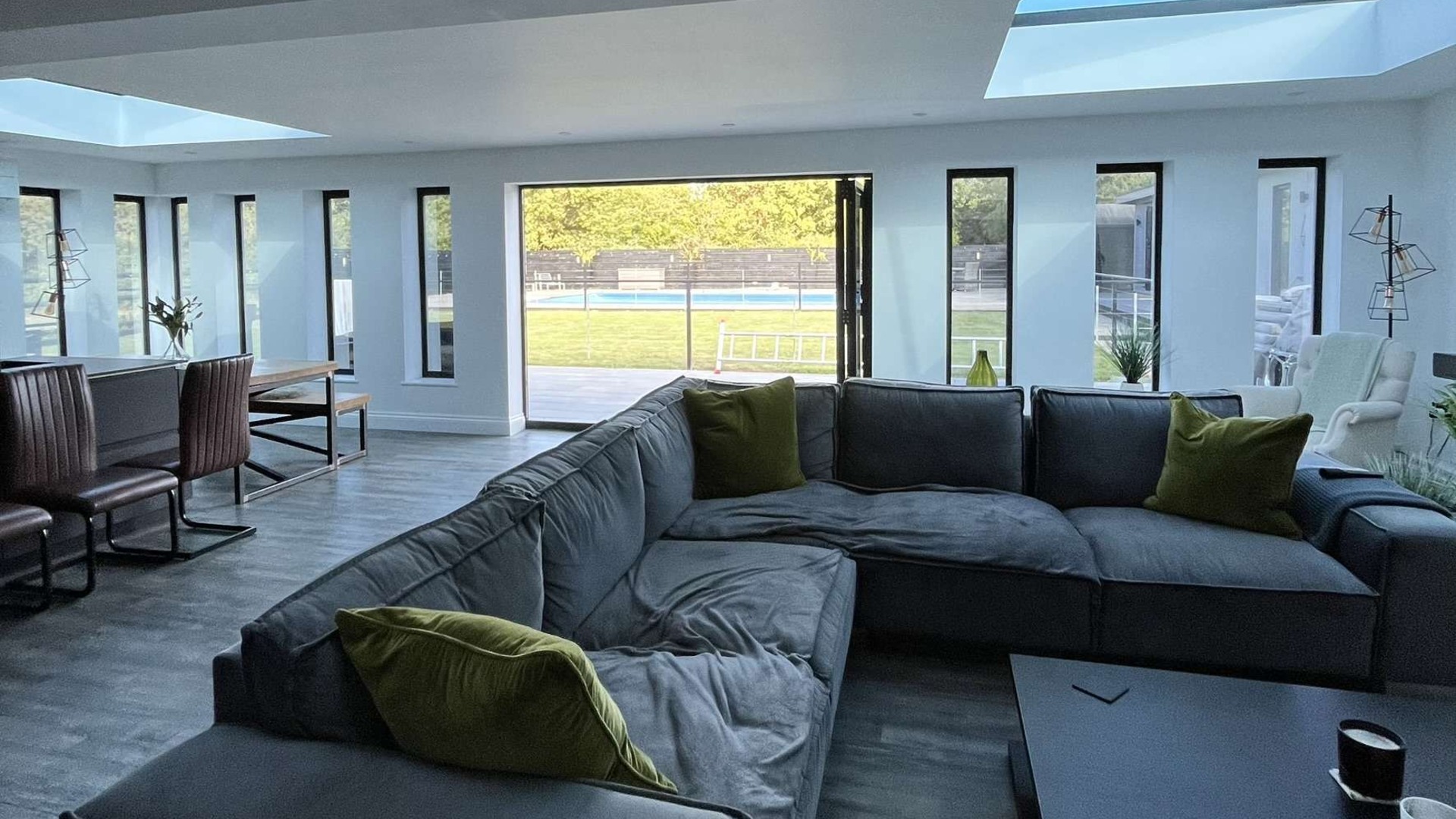 Bright living room below roof windows treated with solar-control film