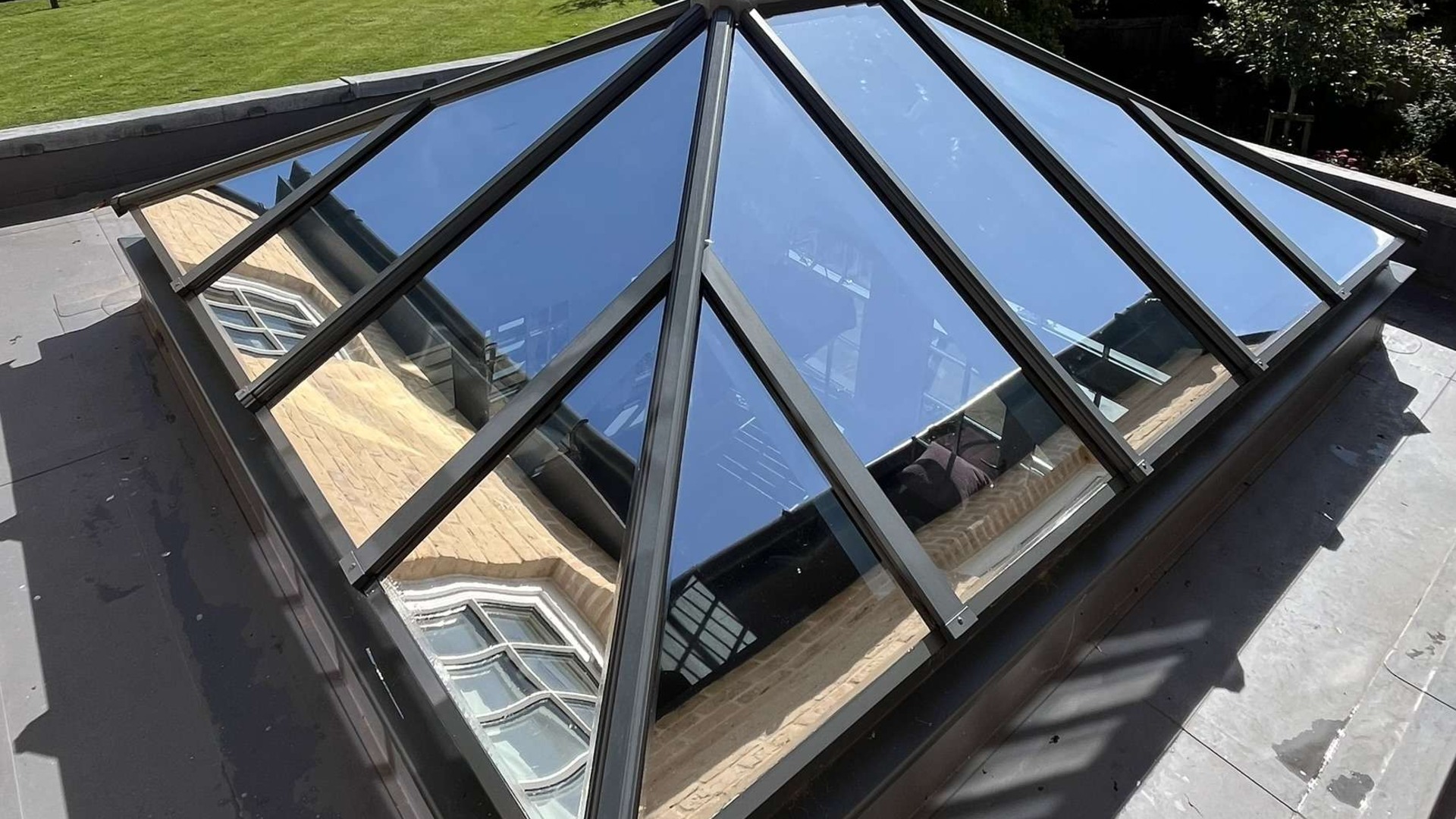 Pyramid skylight covered with reflective Silver 20 exterior window film