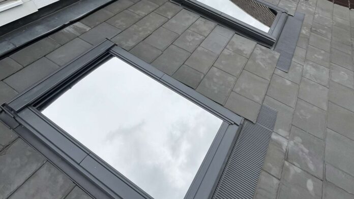 Three VELUX roof windows fitted with External Silver 20 reflective solar film