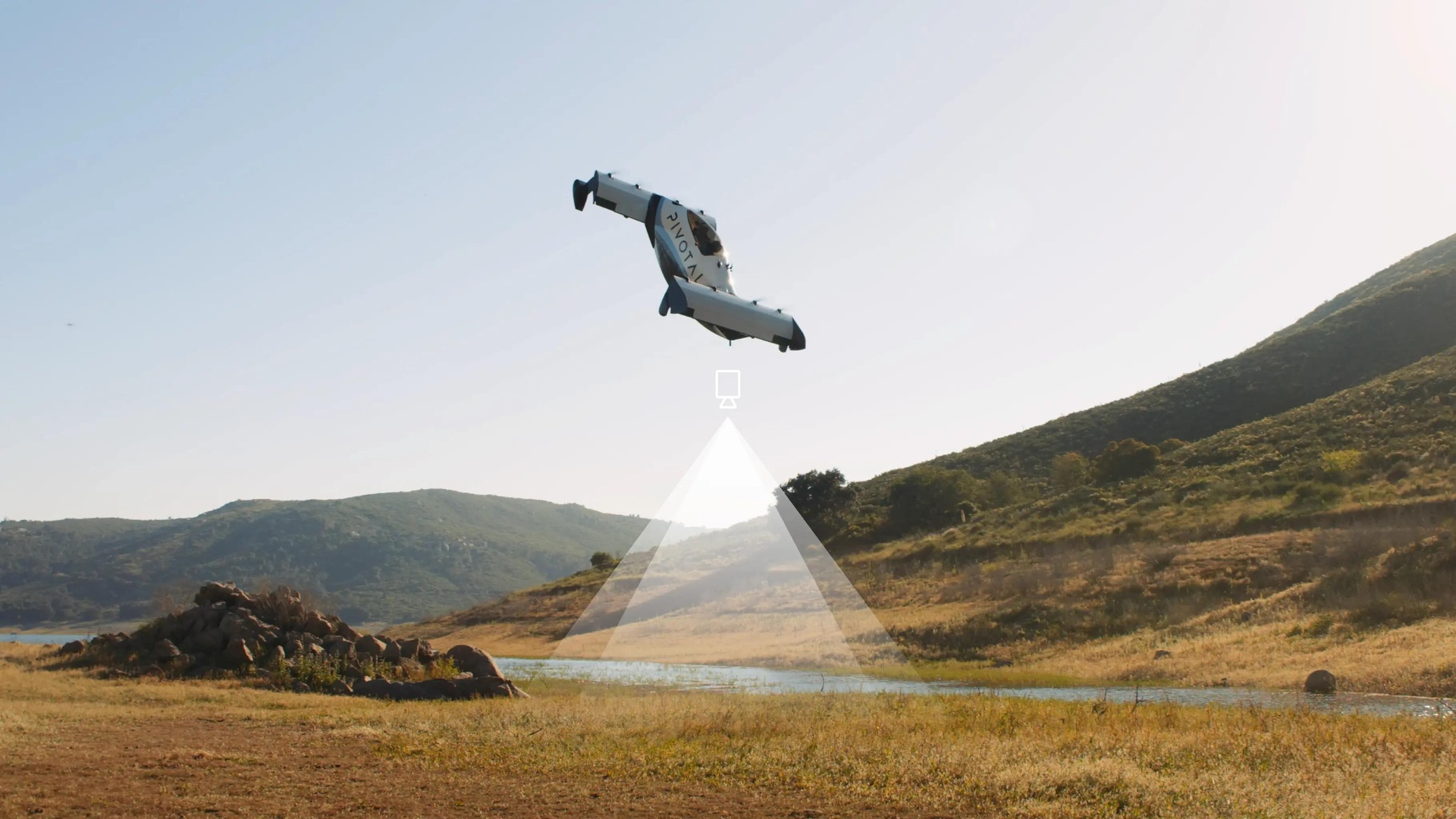 Pivotal Helix demonstrating its automated landing system over an open field