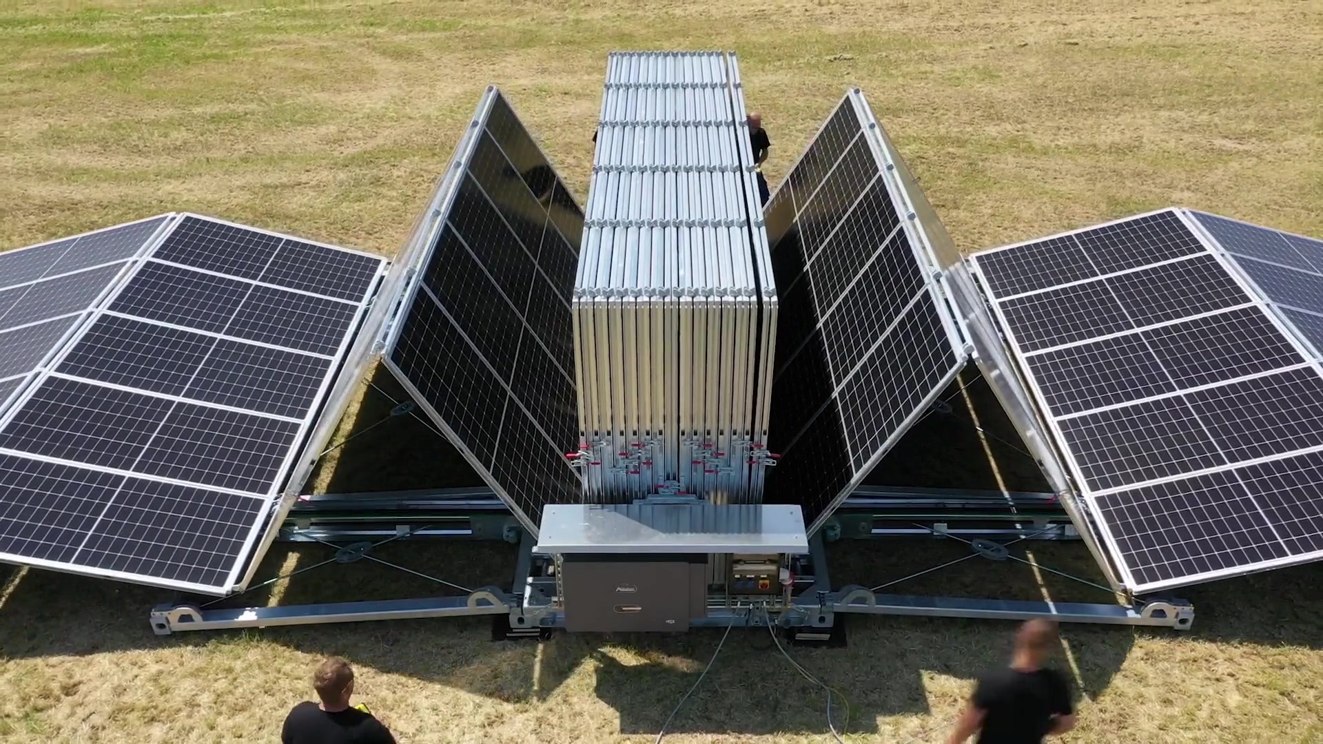 Folding photovoltaic module frames extending from the central Solarcontainer