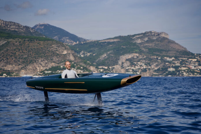Green Foilone Pegasus electric hydrofoil flying above Lake Como