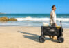 LITEFAR B1 electric beach wagon carrying outdoor gear across soft sand