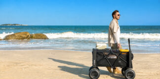 LITEFAR B1 electric beach wagon carrying outdoor gear across soft sand