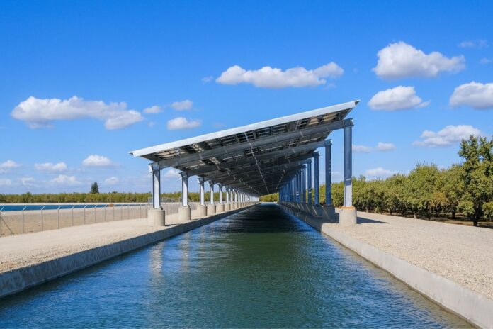 Solar panels installed above a Turlock Irrigation District canal as part of California's Project Nexus pilot