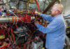 SwRI engineers working on a hydrogen-powered heavy-duty truck engine in a test cell