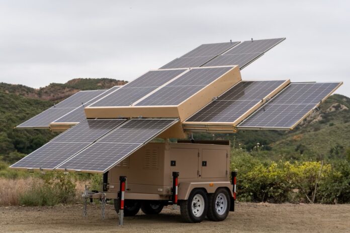 Fully deployed 123eSolar 123-STG-4 trailer with ten solar panels extended in multiple directions