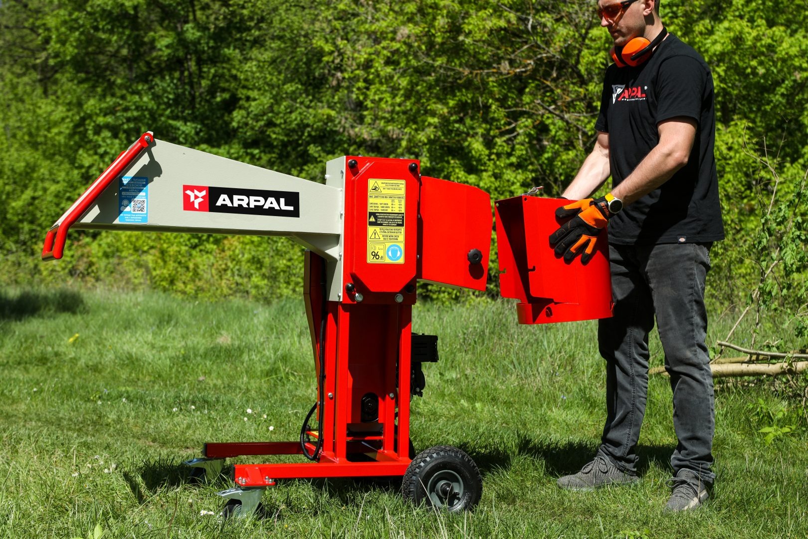 Side view of the ARPAL AM-80BD with its discharge hopper opened for inspection