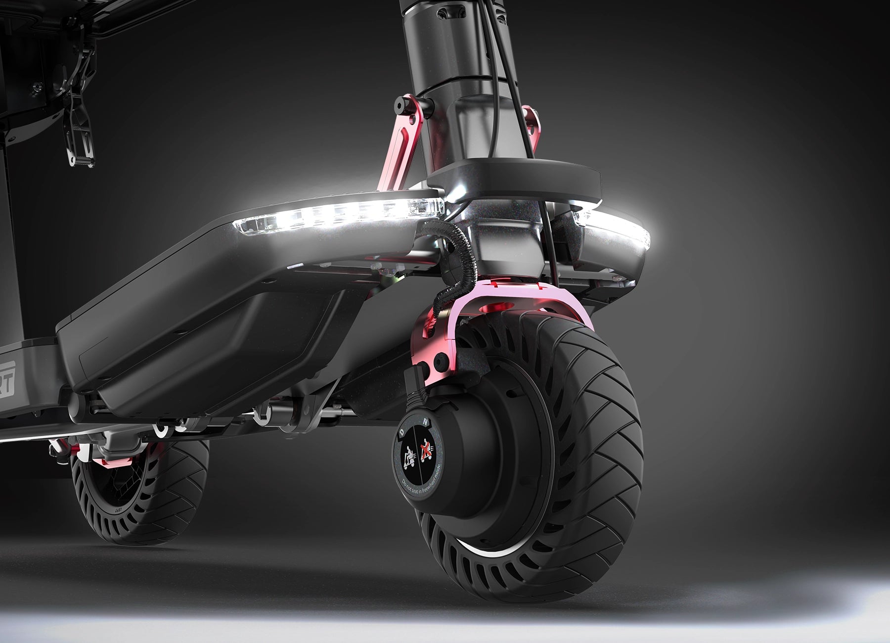 ATTO Sport front LED lights illuminated above its wheels