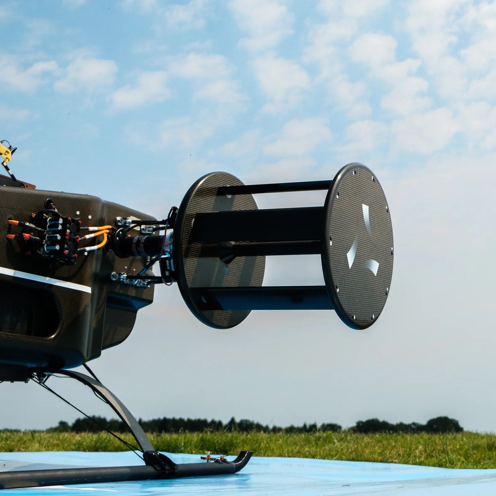 Close-up of a barrel-shaped CycloRotor mounted at the forward end of CycloTech’s BlackBird demonstrator
