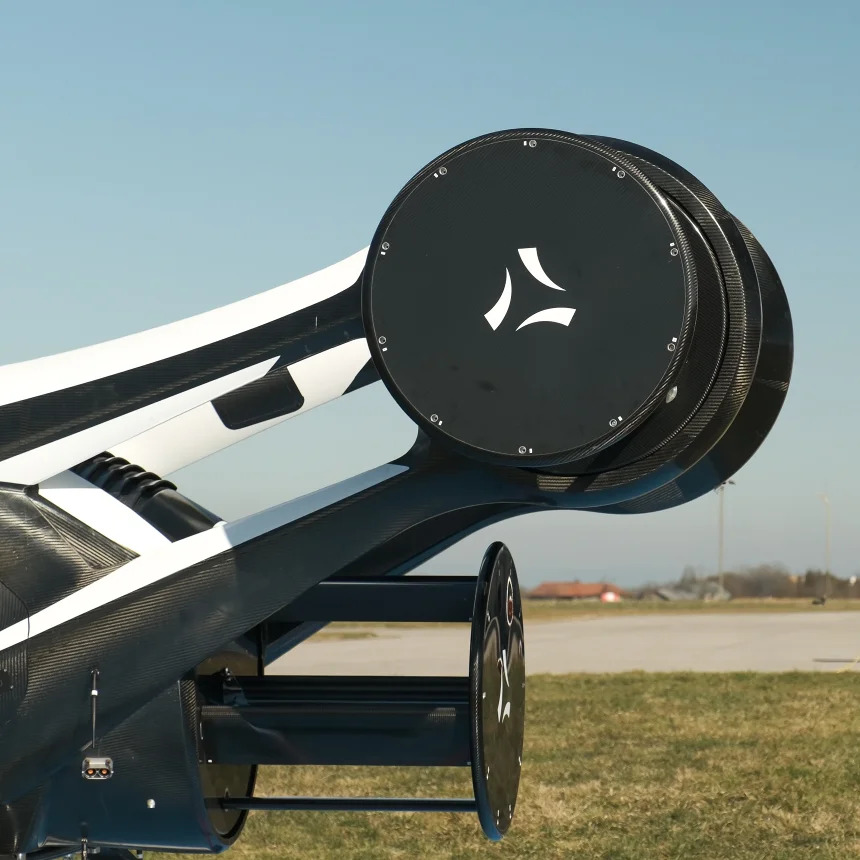Close view of CycloTech’s CR-60 cycloidal aviation rotor with parallel blades between circular end plates