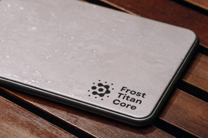 Close-up of the slim Frost Titan Core titanium cooling plate covered in condensation