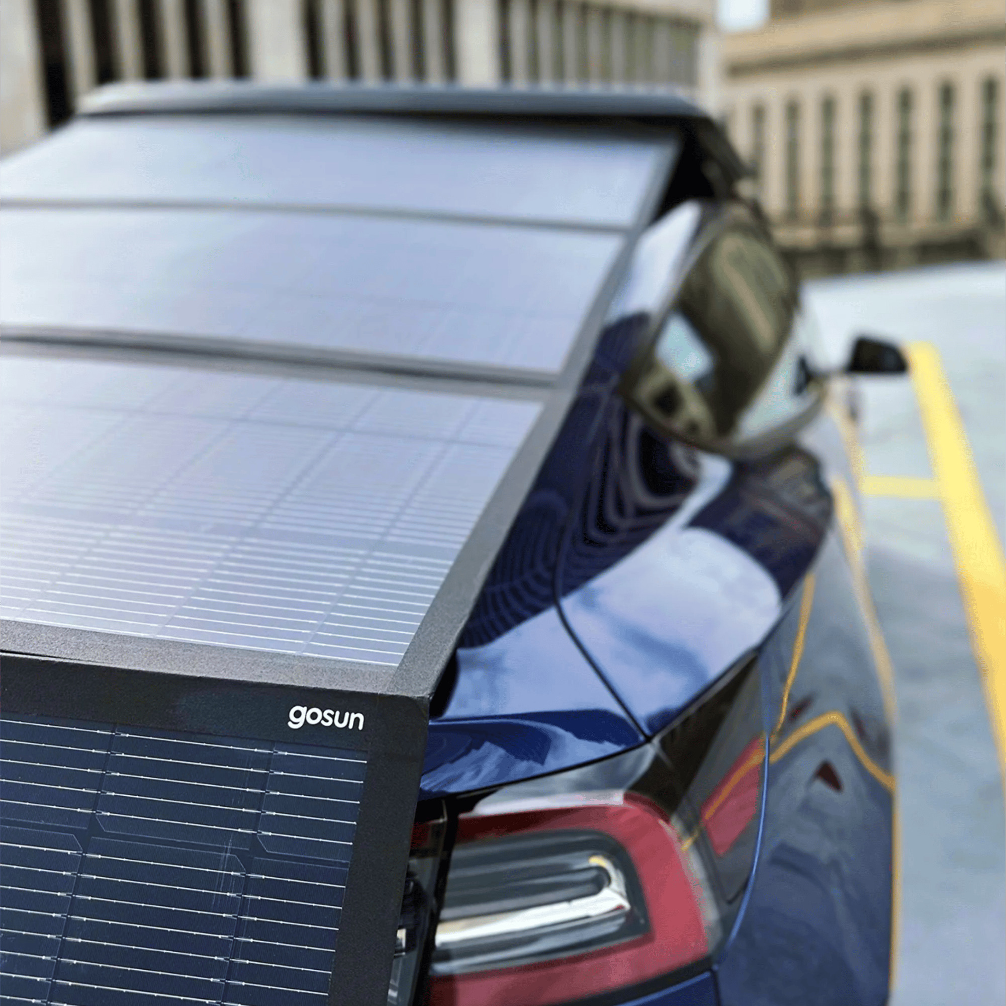 Rear view of the GoSun solar panels extending from their roof-mounted storage case