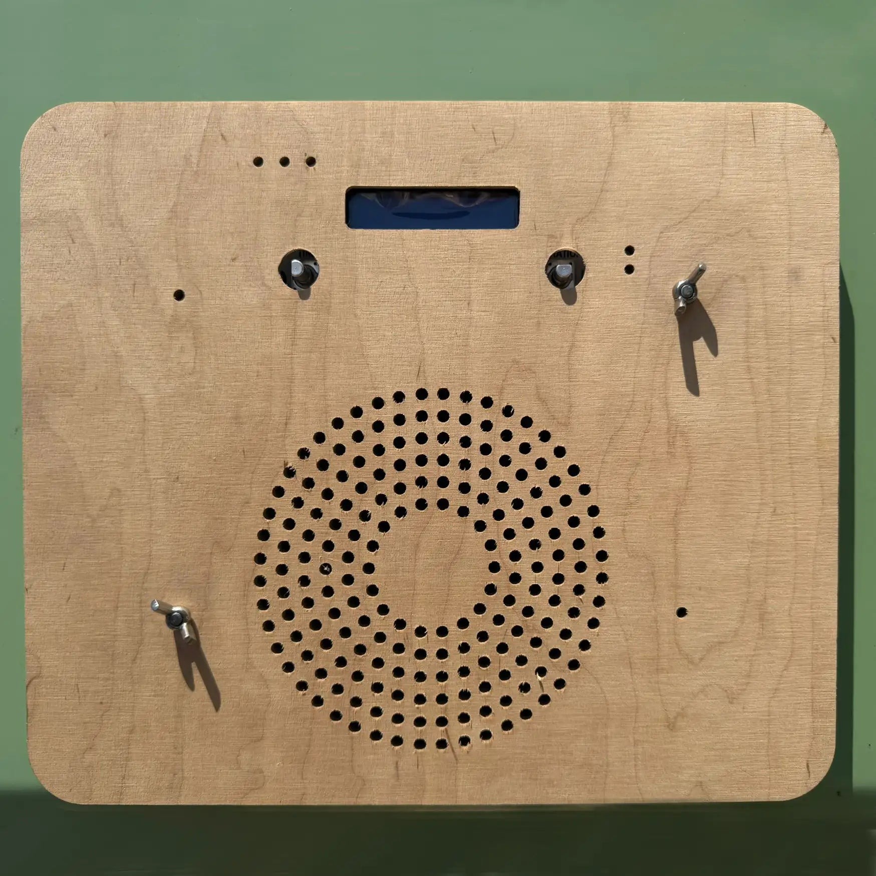 Wooden control panel for the Groundfridge solar-powered ventilation system