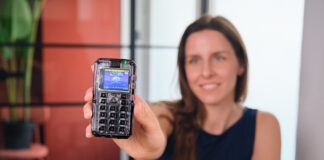 Person holding an assembled MAKERphone 2.0 DIY 4G mobile phone