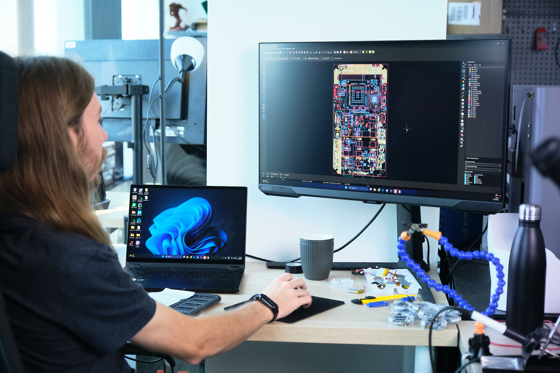 CircuitMess developer working on MAKERphone 2.0 circuit-board designs