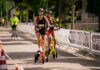 Riders using orange and yellow Me-Mover Speed Ultra outdoor fitness machines