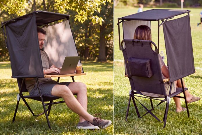 NomaPod portable outdoor workstation with an integrated chair, laptop desk, overhead canopy and side shade panels