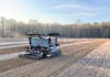 Roboton Farmer tracked agricultural robot preparing rows in a vegetable field