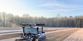 Roboton Farmer tracked agricultural robot preparing rows in a vegetable field