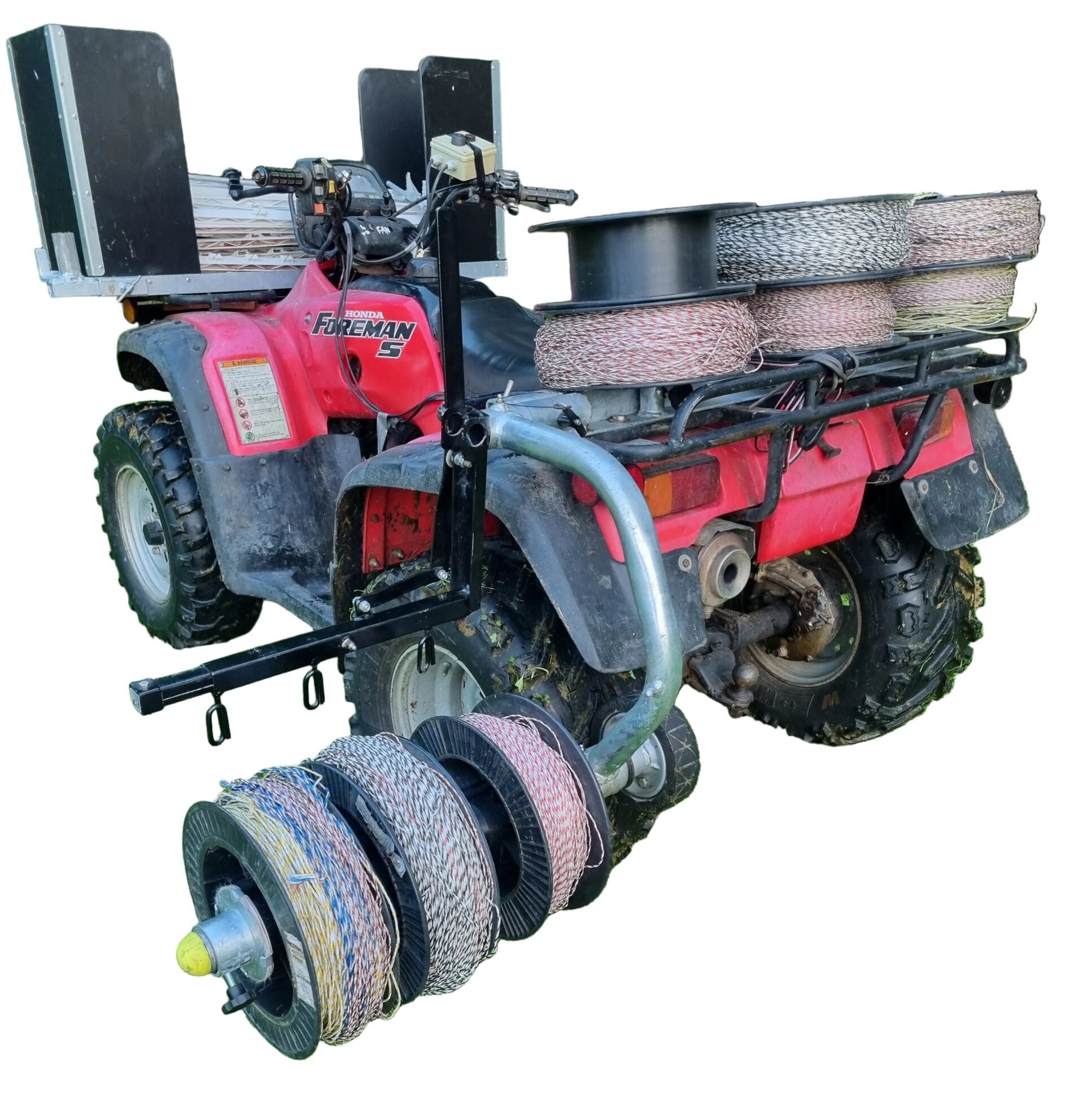 Sheep School ATV fitted with multiple fence-wire reels and poly-post storage boxes