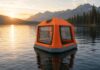 Two views of the orange Sönmez Floating Tent floating near shore on calm water