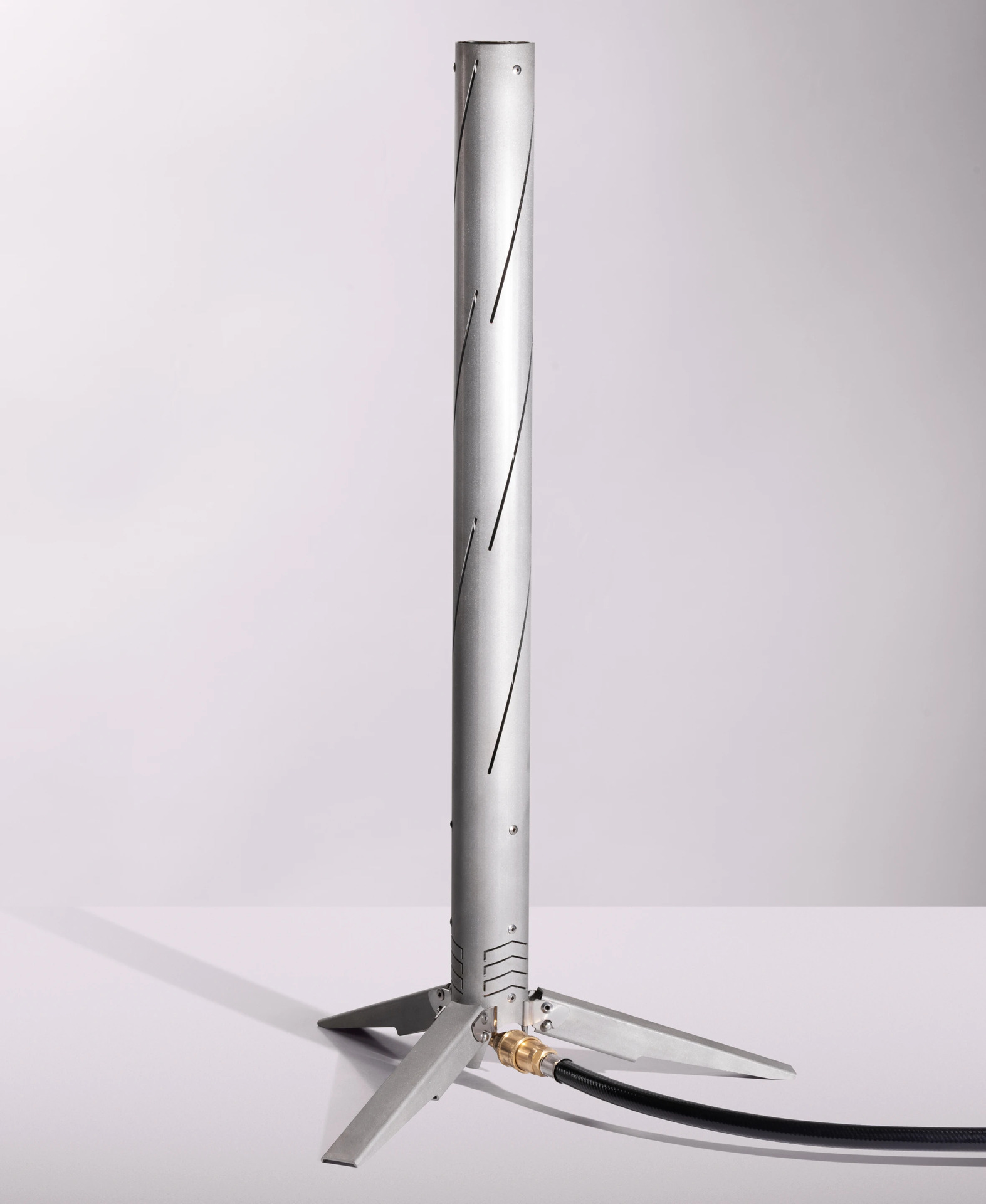 Happy Caveman Campfire standing upright with its regulator hose and folding support legs