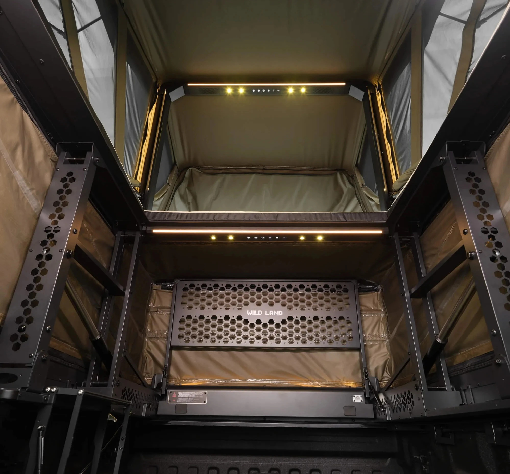 Interior of the Wild Land PickupMate Trunk showing its lower space, upper opening and integrated LED controls