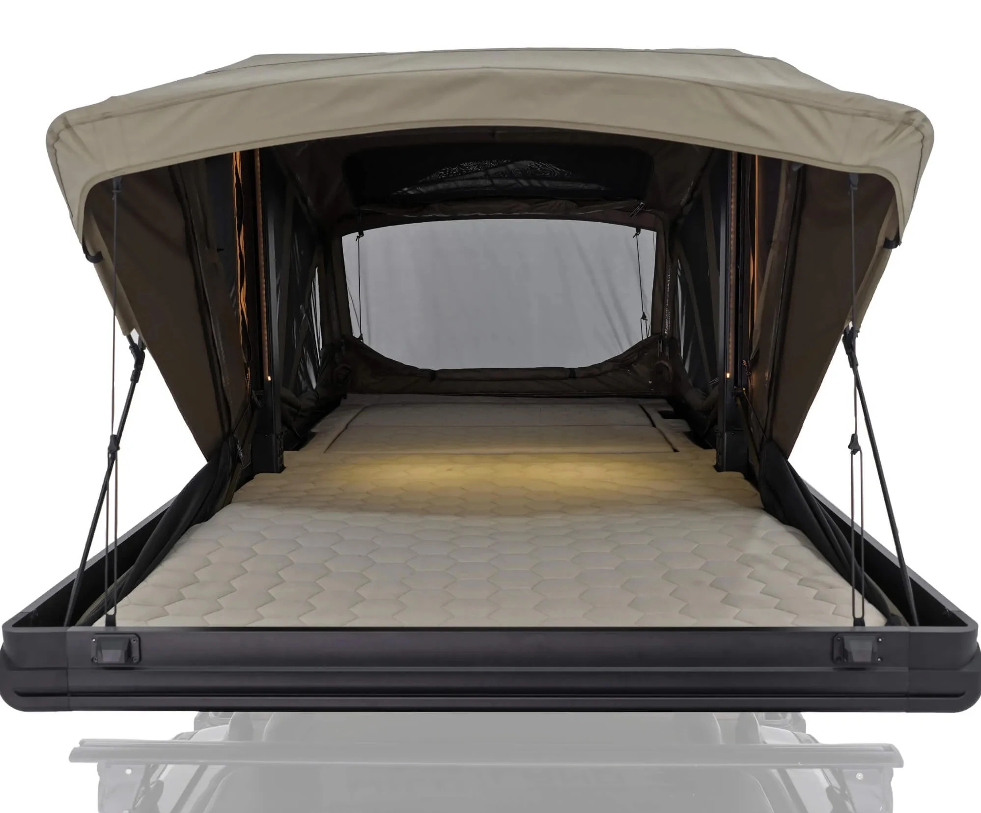 Extra-long mattress inside the upper level of the Wild Land PickupMate Trunk camper