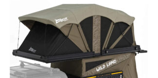 Wild Land PickupMate Trunk fully expanded above a pickup bed as a two-story camping shelter